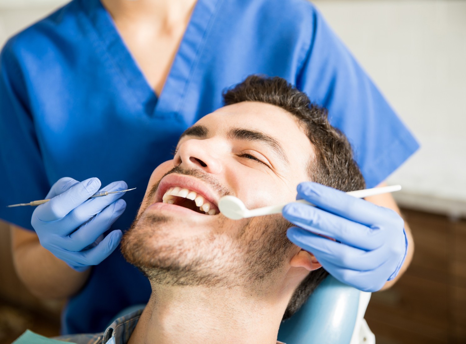 Https://Assets.Tina.Io/C06d8490 A43b 48c0 96ef 818b9b6fe891/Images/Services/Dental Cleanings/Man Getting Dental Work Done.Jpg